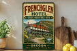 a vintage-style sign for the French Glen Hotel, which is a state heritage site in Oregon. The sign displays a picture of a historic hotel building surrounded by a scenic landscape.