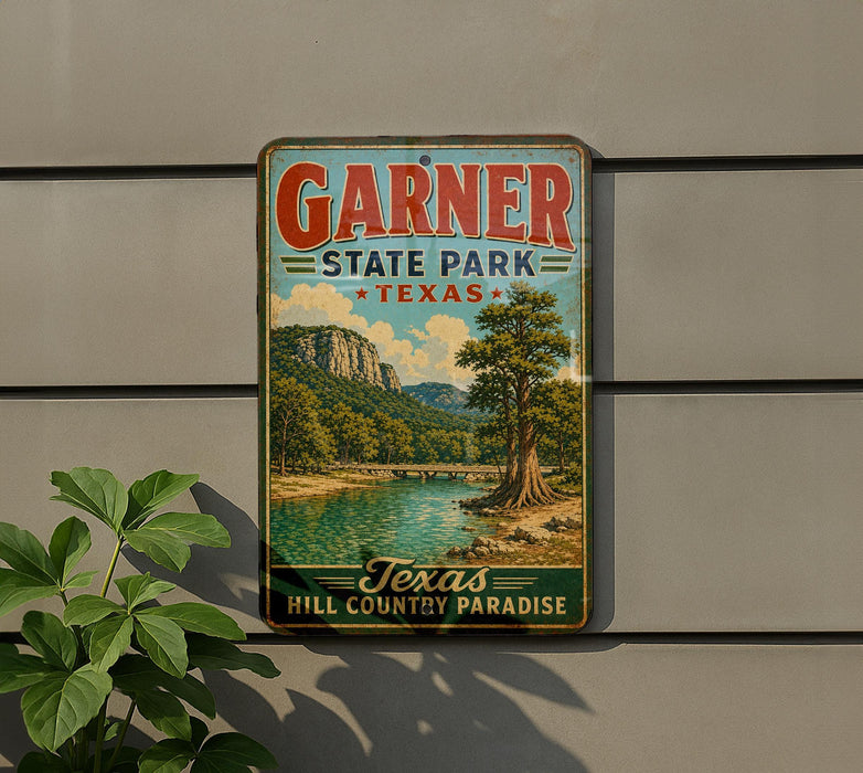 A vintage-style sign for Garner State Park in Texas, featuring a scenic landscape with a river and mountains.