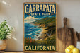 A vintage-style poster of Garrapata State Park in California, featuring a scenic coastal landscape with mountains, ocean, and flowers.
