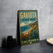 A vintage-style metal sign for Gaviota State Park in California, featuring a scenic landscape with mountains, a beach, and a desert.