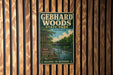 A vintage metal sign for Gebhard Woods State Park in Illinois, featuring a scenic illustration of a river and forest.