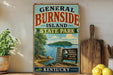 A vintage-style sign for General Burnside Island State Park in Kentucky, featuring a scenic landscape with a lake, mountains, and a wooden sign welcoming visitors to the park.