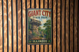 A vintage-style sign for Giant City State Park in Illinois, featuring a scenic image of a rock formation and trees.