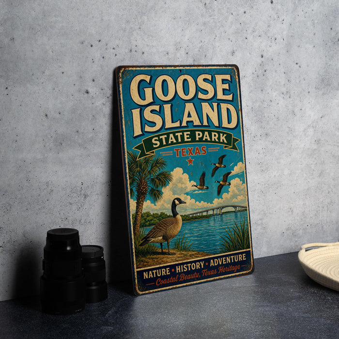 A vintage-style metal sign for Goose Island State Park in Texas, featuring a colorful illustration of a goose, palm trees, and a body of water.