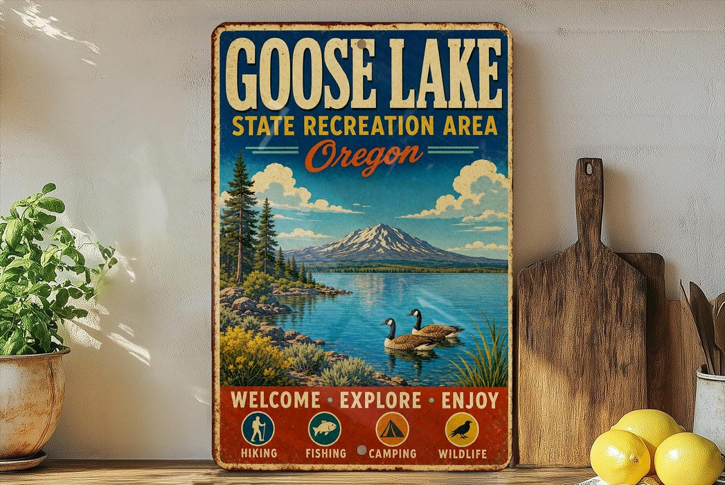 A vintage-style metal sign for Goose Lake State Recreation Area in Oregon, featuring a scenic landscape with a mountain, lake, and ducks.