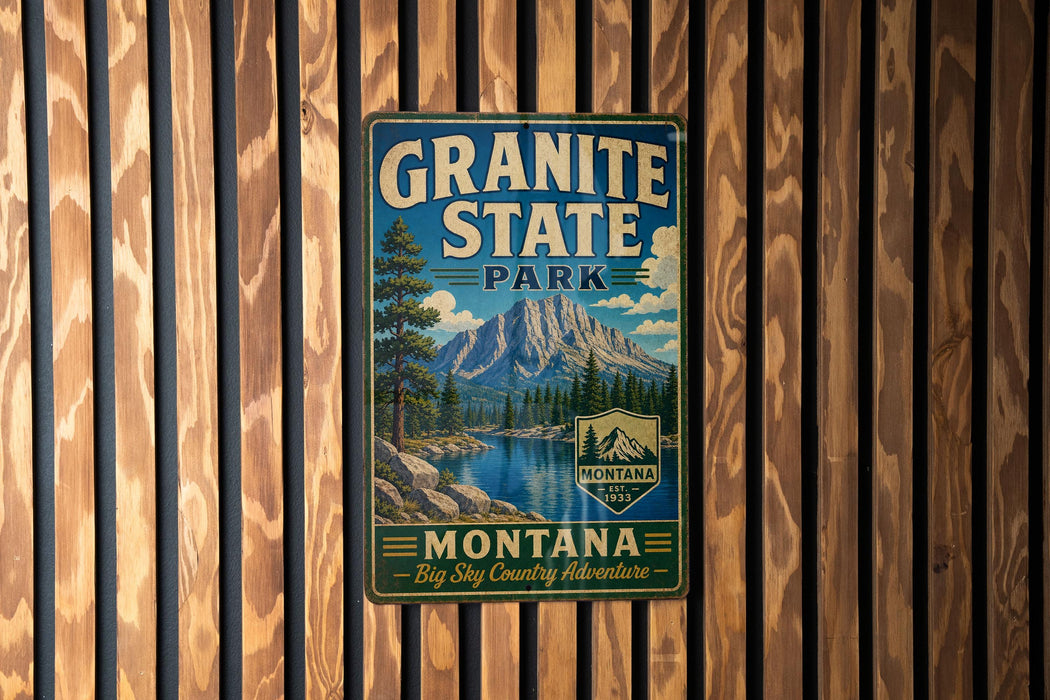 A vintage-style metal sign for Granite State Park in Montana, featuring a mountain landscape and the park's name.