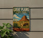 A vintage-style sign for Great Plains State Park in Oklahoma, featuring a buffalo grazing in the foreground and a desert landscape with mountains in the background.