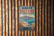 A vintage metal sign for Great Salt Lake State Park in Utah, featuring a scenic illustration of the lake and mountains.