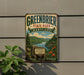 A vintage-style sign for Greenbrier State Park, Maryland, featuring a scenic landscape with mountains, lakes, and forests.