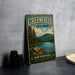 A vintage-style metal sign for Greenfield State Park, featuring a scenic landscape with pine trees, a lake, and mountains.