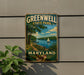 A vintage metal sign for Greenwell State Park in Maryland, featuring a scenic landscape with a lake, trees, and a sailboat.