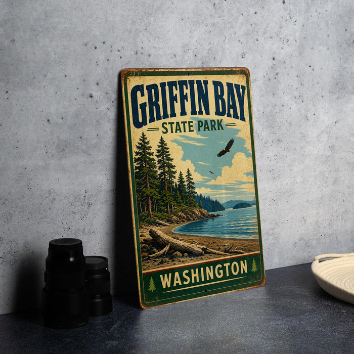 A vintage-style sign for Griffin Bay State Park in Washington, featuring a scenic landscape with pine trees, a lake, and a bird in flight.