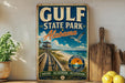 A vintage-style sign for Gulf State Park, Alabama, featuring a wooden boardwalk leading to a beach and palm trees, with a bird flying overhead.