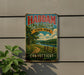 A vintage-style metal sign for Haddam Meadows State Park in Connecticut, featuring a scenic landscape with a path, trees, and a river.