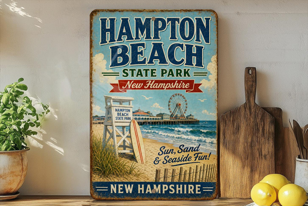 A vintage-style sign for Hampton Beach State Park in New Hampshire, featuring a beach scene with a lifeguard chair, a ferris wheel, and a sign that says "Sun, Sand & Seaside Fun!"