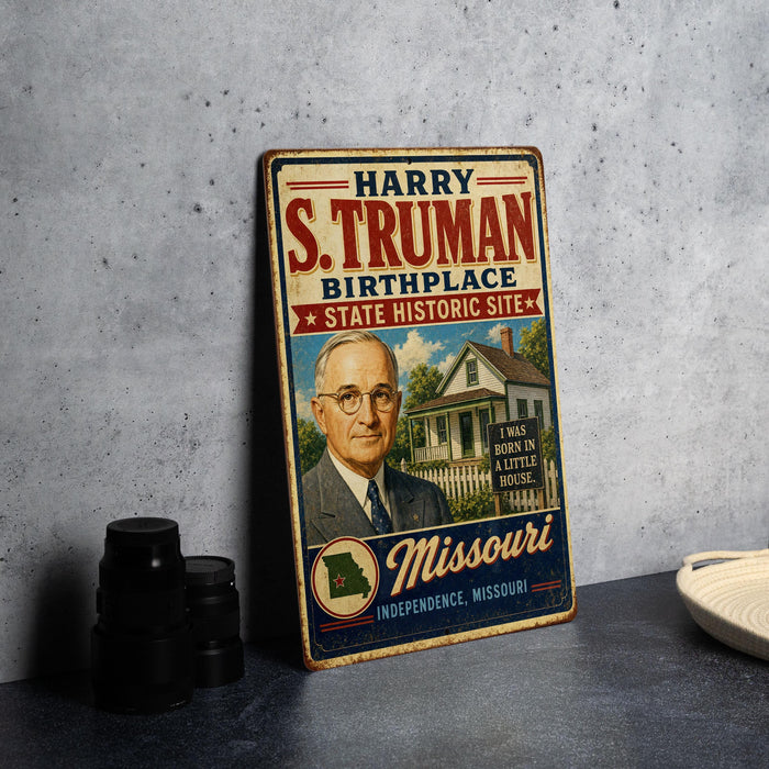 a vintage-style metal sign with text and an illustration of a man in a suit, standing in front of a house.