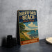 A vintage-style metal sign for "Harford Beach State Park" in South Dakota, featuring a scenic beach landscape with a sailboat and a cloudy sky.