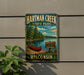 A vintage-style metal sign for Hartman Creek State Park in Wisconsin, featuring a canoe on a lake surrounded by trees.