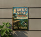 A vintage-style metal sign for Hawk's Nest State Park in West Virginia, featuring a scenic landscape with a cliff, river, and trees.