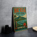 A vintage-style sign for He'eia State Park in Oahu, Hawaii, featuring a tropical landscape with palm trees, mountains, and a tiki statue.