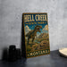 A metal sign for Hell Creek State Park in Montana, featuring a dinosaur illustration and the park's name.