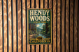 A vintage metal sign for Hendy Woods State Park in California, featuring a scenic illustration of the park's natural surroundings.