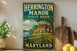 A vintage-style metal sign for Herrington Manor State Park in Maryland, featuring a house and a river in the background.