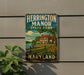 A vintage-style metal sign for Herrington Manor State Park in Maryland, featuring a house and a lake in the background.