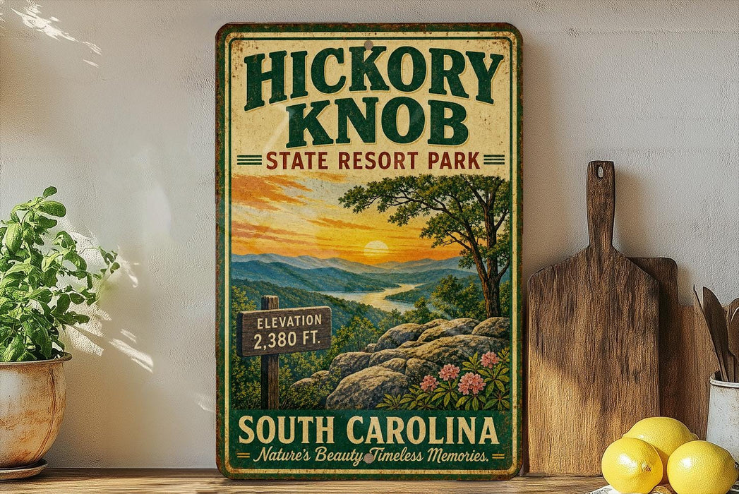 A vintage-style sign for Hickory Knob State Resort Park, featuring a scenic mountain landscape with a sunset.