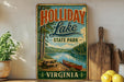 A vintage-style sign for Holliday Lake State Park in Virginia, featuring a scenic image of a lake, trees, and a canoe.