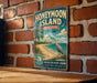 A vintage-style metal sign for Honeymoon Island State Park in Florida, featuring a beach scene with a crane and palm trees.