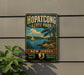 A vintage-style metal sign for Hopatcong State Park, New Jersey, featuring a scenic landscape with a sailboat on the water and pine trees in the background.