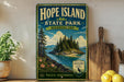 A vintage-style metal sign for Hope Island State Park in Washington, featuring a scenic landscape with pine trees, a lake, and mountains.