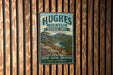 A vintage metal sign for Hughes Mountain Natural Area in Missouri, featuring a scenic landscape with a river and mountains.