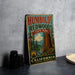 A vintage-style sign for Humboldt Redwoods State Park, featuring a scenic illustration of the park's landscape with towering redwood trees and a river.