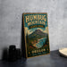 A vintage-style metal sign for Humbug Mountain State Park in Oregon, featuring a scenic mountain landscape and the text "Oregon Explore, Relax, Enjoy."