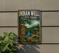 A vintage-style sign for Indian Well State Park in Connecticut, featuring a scenic landscape with a gazebo and a lake.