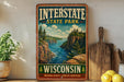 A vintage-style metal sign for Interstate State Park in Wisconsin, featuring a scenic landscape with a river, cliffs, and pine trees.