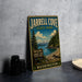 A vintage-style metal sign for Jarrell Cove State Park, featuring a scenic landscape with a mountain, pine trees, and a lake.