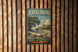 A vintage-style metal sign for Jekyll Island State Park in Georgia, featuring a scenic illustration of a beach, palm trees, and a lighthouse.