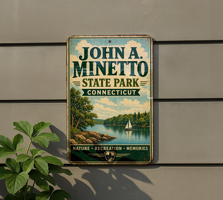A vintage-style metal sign for John A. Minetto State Park in Connecticut, featuring a scenic landscape with a lake, trees, and a sailboat.