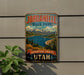 A vintage-style metal sign for Jordanelle State Park in Utah, featuring a scenic mountain landscape with a lake and pine trees.