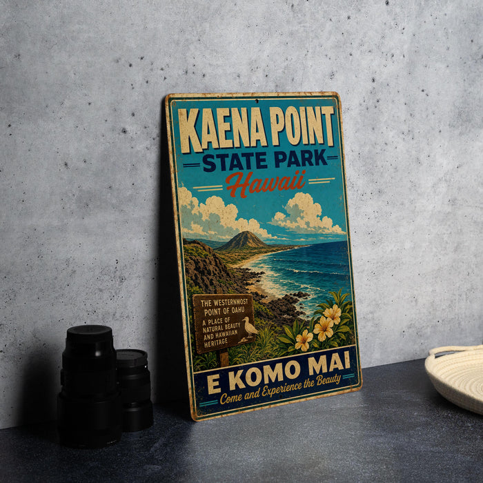 A vintage-style metal sign for Kaena Point State Park in Hawaii, featuring a scenic coastal landscape with mountains, ocean, and flowers.
