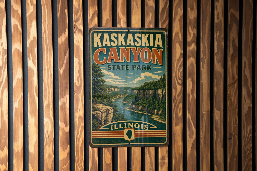 A vintage-style metal sign for Kaskasia Canyon State Park in Illinois, featuring a scenic illustration of the canyon landscape.