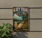 A vintage-style metal sign for Katy Trail State Park in Missouri, featuring a scenic illustration of a bridge, path, and surrounding landscape.
