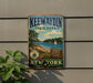 A vintage-style metal sign for Keeawayin State Park, New York, featuring a scenic landscape with a lake, pine trees, and a sailboat.