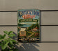 A vintage-style sign for Kentucky Village State Resort Park, featuring a scenic illustration of the park and its surroundings.