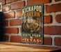 A vintage-style metal sign for the Kickapoo Canyon State Park in Texas, featuring an illustration of the cave system.