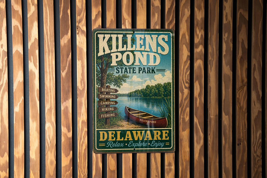 A vintage metal sign for Killens Pond State Park in Delaware, featuring a canoe on a lake and text promoting the park's recreational activities.