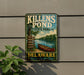 A metal sign on a wall advertising Killens Pond State Park in Delaware, featuring a scenic image of a lake with a canoe and surrounded by trees.